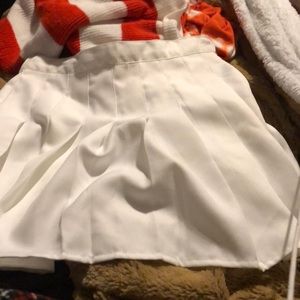 white pleaded skirt